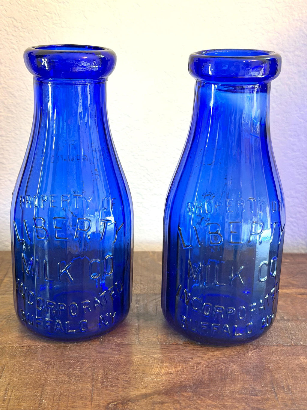 Pair Cobalt Blue Liberty Milk Bottles Buffalo NY Embossed Glass Dairy Bottles VINTAGE